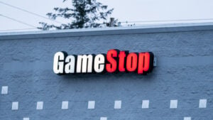 GameStop (GME) sign on side of building in blue morning light