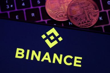 The illustration shows the Binance logo and representation of cryptocurrencies