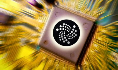 IOTA-logo-with-golden-digital-background.